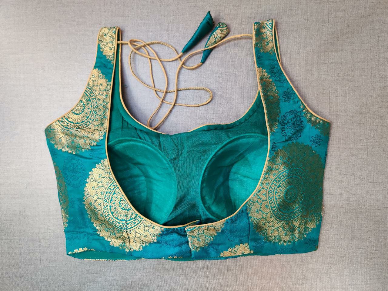 Buy stunning sea green Banarasi padded saree blouse online in USA. Elevate your Indian ethnic saree looks with beautiful readymade sari blouse, embroidered saree blouses, Banarasi saree blouse, designer saree blouses, sleeveless saree blouses from Pure Elegance Indian fashion store in USA.-back