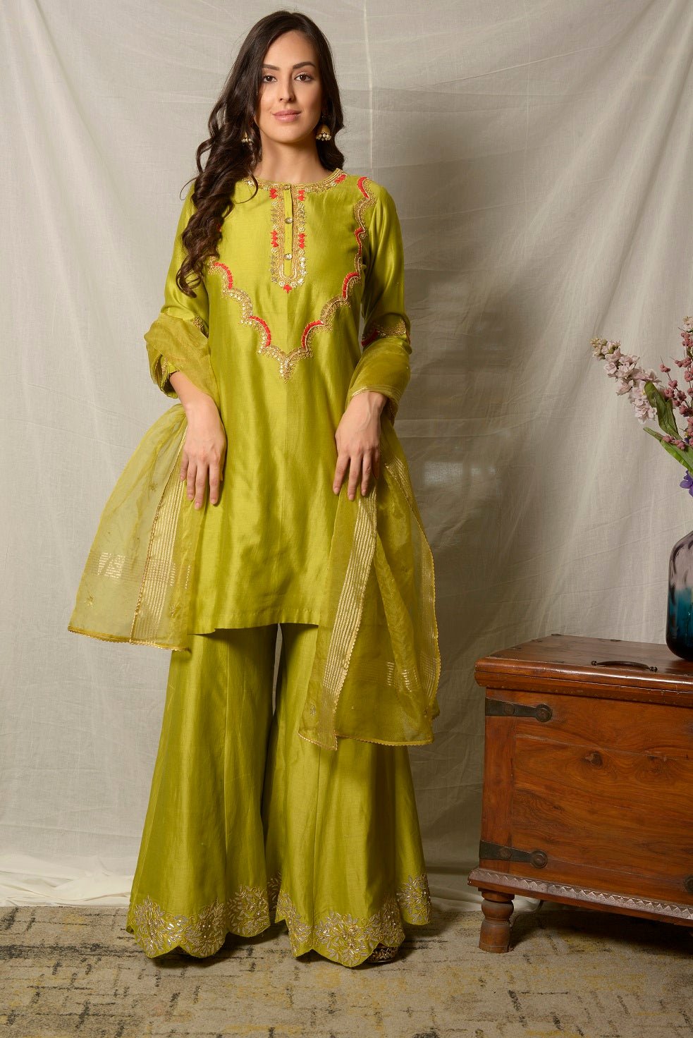 Shop beautiful pista green embroidered chanderi sharara suit online in USA with dupatta. Shine at weddings and special occasions with beautiful Indian designer suits, gowns, lehengas from Pure Elegance Indian clothing store in USA.-full view