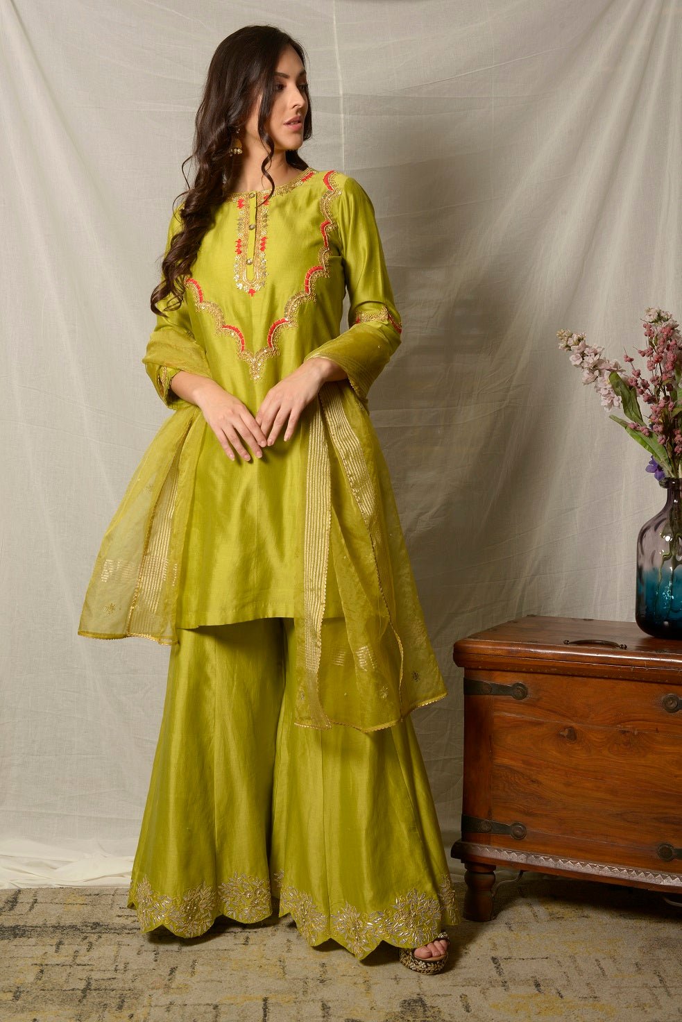 Shop beautiful pista green embroidered chanderi sharara suit online in USA with dupatta. Shine at weddings and special occasions with beautiful Indian designer suits, gowns, lehengas from Pure Elegance Indian clothing store in USA.-side
