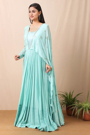 Shop gorgeous teal blue anarkali suit online in USA with thread embroidery and dupatta. Get festive ready in beautiful designer Anarkali suits, designer lehenga, wedding gowns, sharara suits, designer sarees from Pure Elegance Indian fashion store in USA.-Side view.