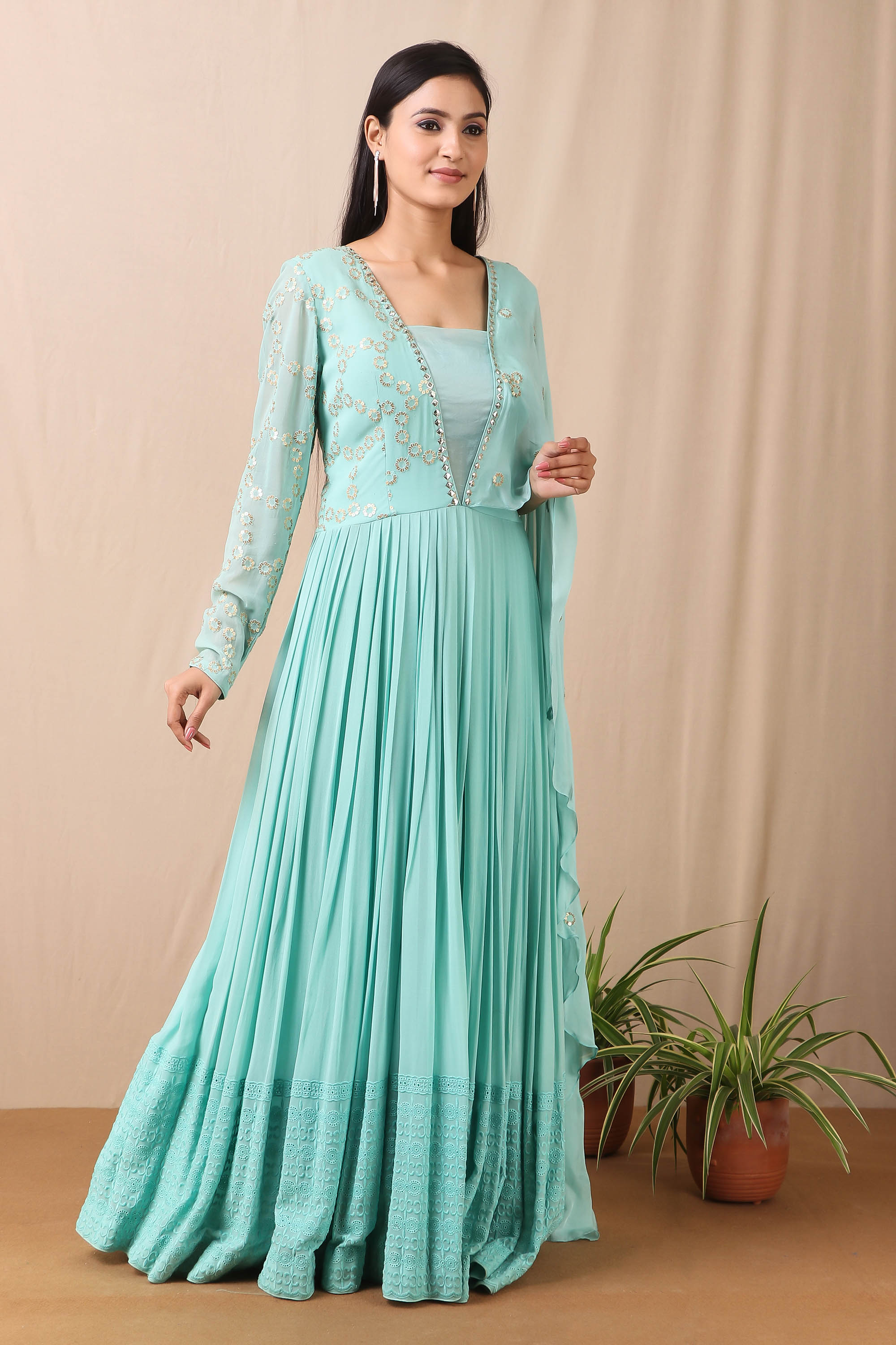 Shop gorgeous teal blue anarkali suit online in USA with thread embroidery and dupatta. Get festive ready in beautiful designer Anarkali suits, designer lehenga, wedding gowns, sharara suits, designer sarees from Pure Elegance Indian fashion store in USA.-Side view.