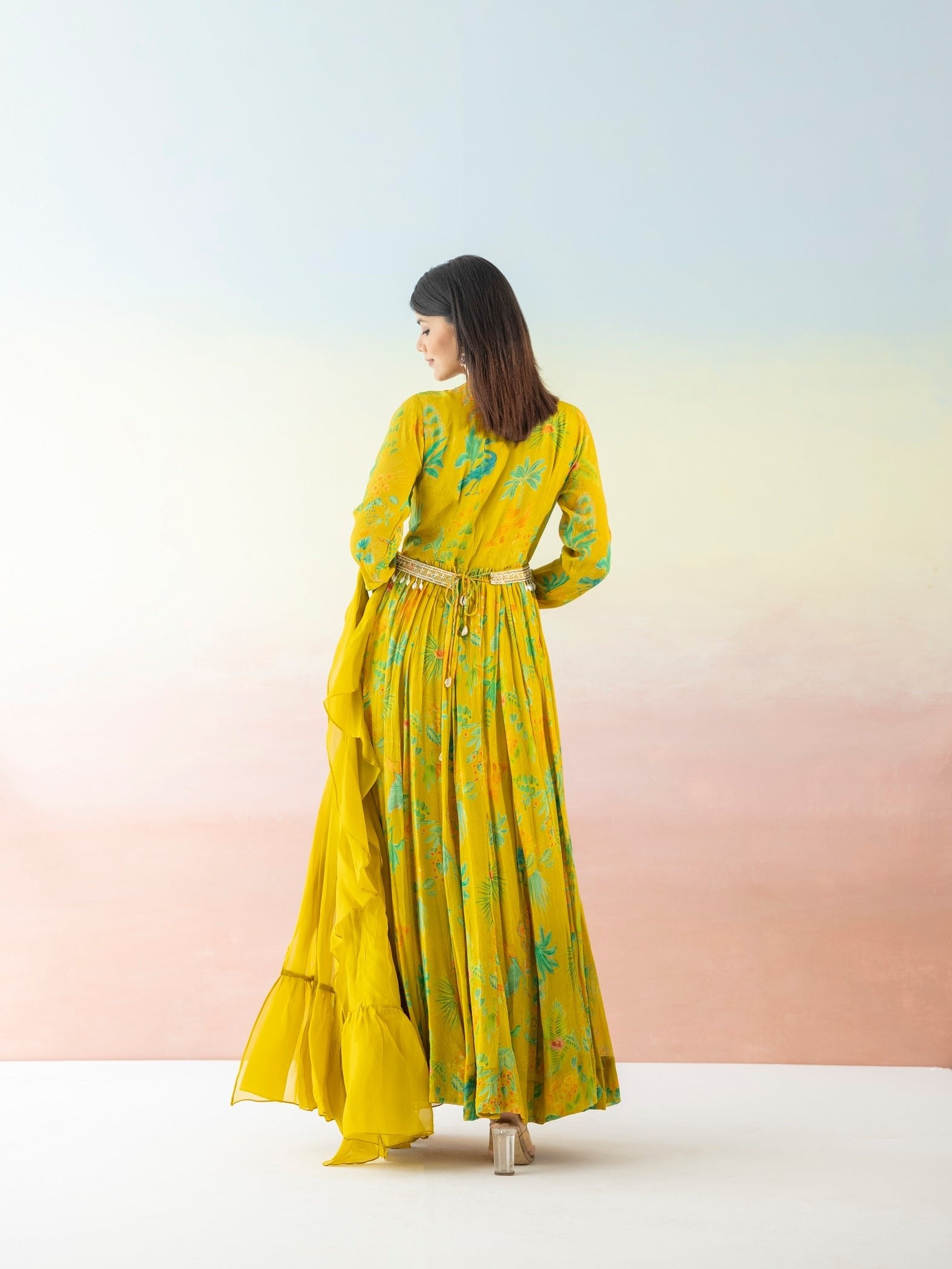 Shop yellow printed georgette Anarkali online in USA with dupatta. Make a fashion statement on festive occasions and weddings with designer suits, Indian dresses, Anarkali suits, palazzo suits, designer gowns, sharara suits from Pure Elegance Indian fashion store in USA.-back
