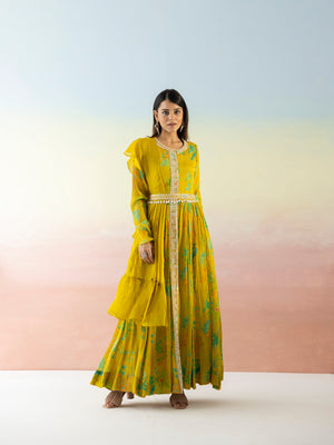 Shop yellow printed georgette Anarkali online in USA with dupatta. Make a fashion statement on festive occasions and weddings with designer suits, Indian dresses, Anarkali suits, palazzo suits, designer gowns, sharara suits from Pure Elegance Indian fashion store in USA.-front