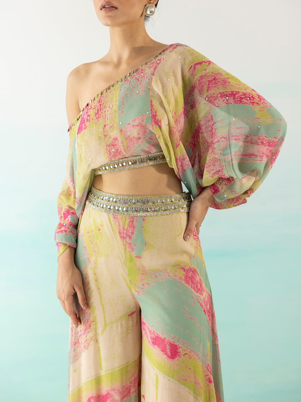 Shop beautiful multicolor mirror work palazzo online in USA with crop top. Make a fashion statement on festive occasions and weddings with designer suits, Indian dresses, Anarkali suits, palazzo suits, designer gowns, sharara suits from Pure Elegance Indian fashion store in USA.-top