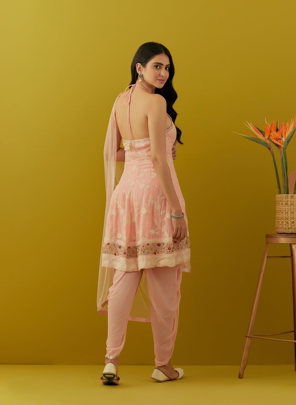 Buy beautiful light pink embroidered georgette dhoti suit online in USA with dupatta. Dazzle on weddings and special occasions with exquisite Indian designer dresses, sharara suits, Anarkali suits, bridal lehengas, sharara suits from Pure Elegance Indian clothing store in USA.-back