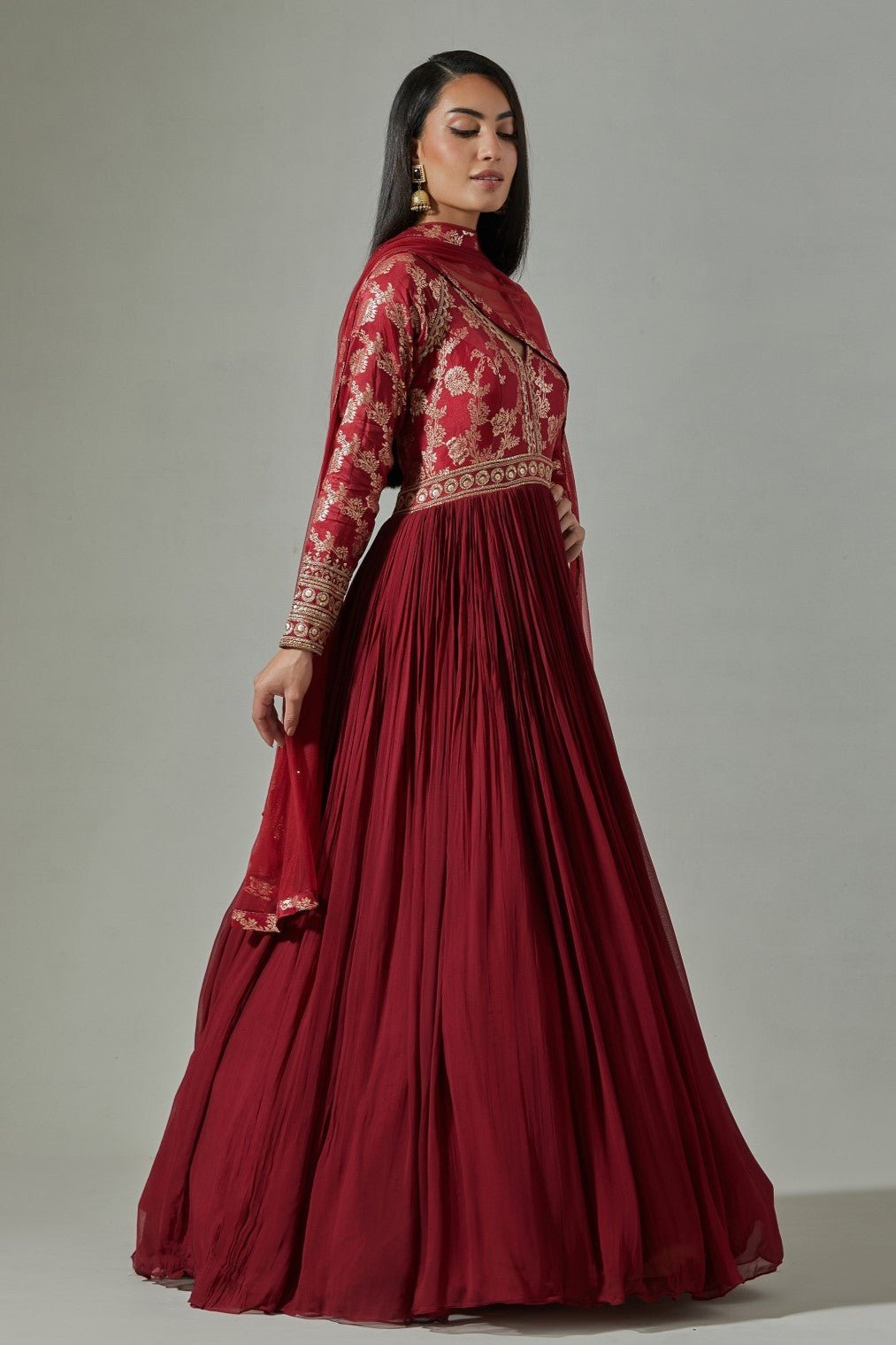 Buy beautiful maroon georgette Anarkali online in USA with embroidered Banarasi yoke. Dazzle on weddings and special occasions with exquisite Indian designer dresses, sharara suits, Anarkali suits, wedding lehengas from Pure Elegance Indian fashion store in USA.-side