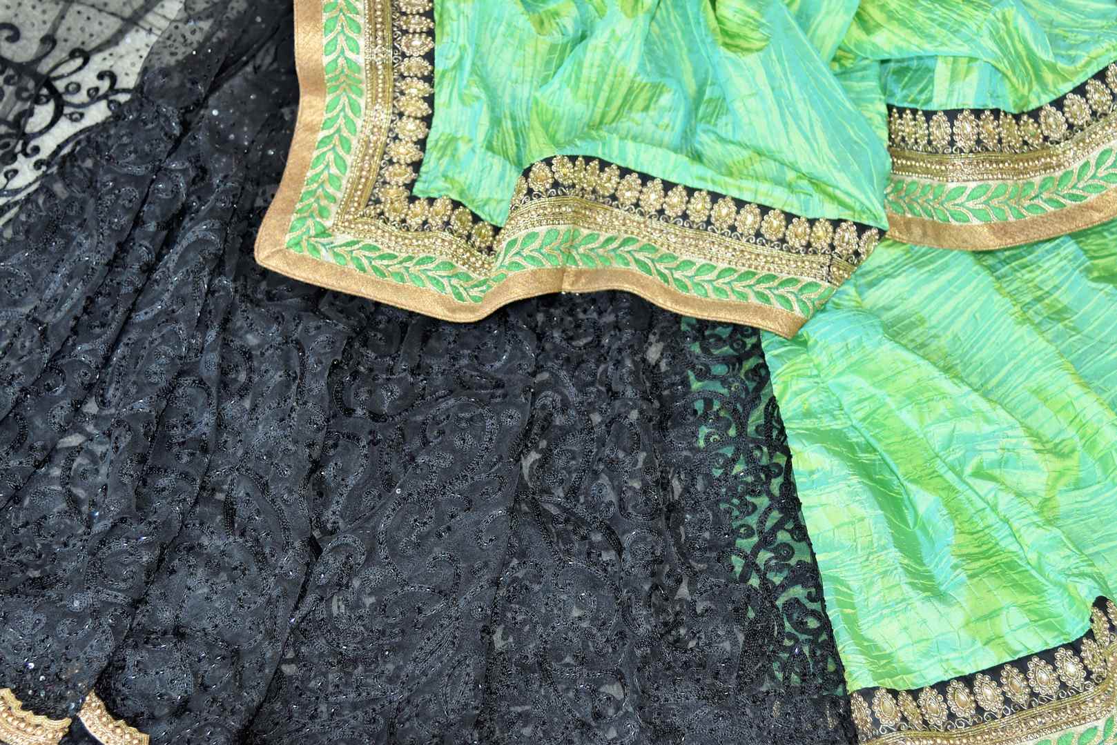 Buy green silk and black net embroidered half and half saree online in USA from Pure Elegance. Let your ethnic style be one of a kind with an exquisite variety of Indian handloom sarees, pure silk sarees, designer sarees from our exclusive fashion store in USA.-details