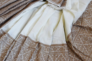 White muga banarasi pure handloom saree. Ethnic saree perfect for Indian pujas, festivals and in weddings.-close up