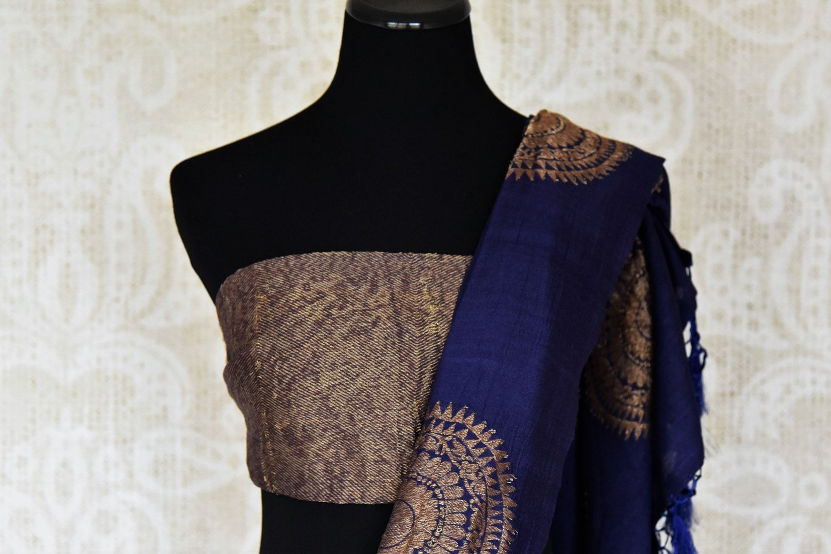 Shop navy blue muga silk saree online in USA with big chakra zari buta. Elevate your traditional style with exquisite Indian handloom sarees from Pure Elegance Indian clothing store in USA. Explore a range of stunning pure silk saris, embroidered sarees, wedding sarees especially from India for women in USA.-blouse pallu