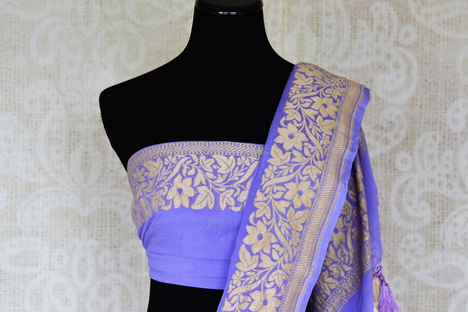 Buy mauve purple georgette Banarasi saree online in USA with silver foliate zari border. Elevate your traditional saree style with beautiful Indian Banarasi saris from Pure Elegance Indian fashion store in USA. We also have a stunning variety of bridal saris for Indian brides in USA. Shop now.-blouse pallu
