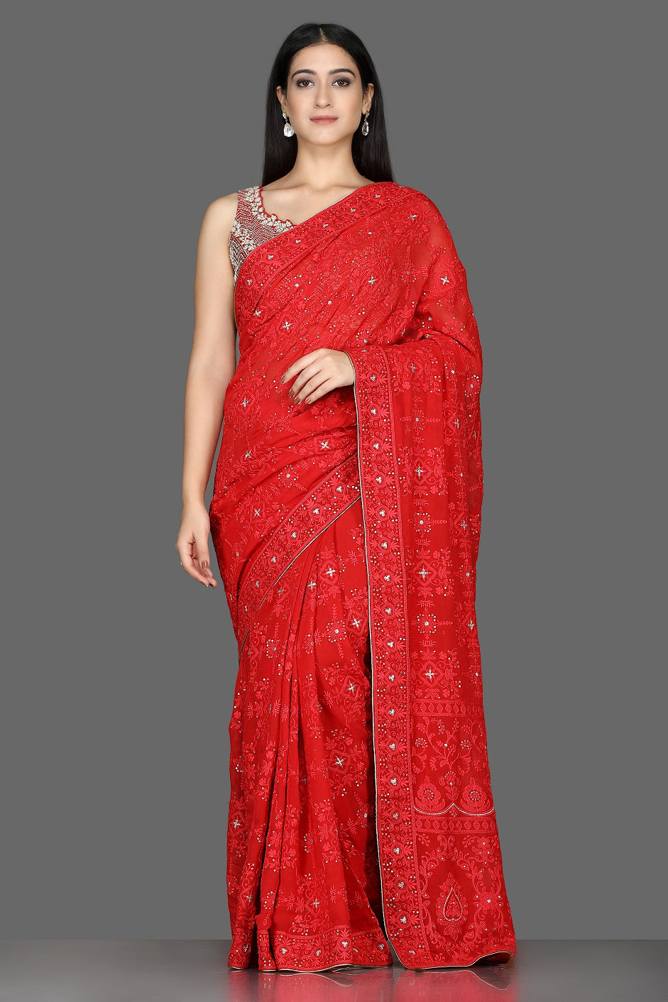 Shop ravishing red Lucknowi georgette sari online in USA with embroidered saree blouse. Shine at weddings and special occasions with beautiful embroidered sarees, designer sari with blouse in USA from Pure Elegance Indian clothing in USA.-full view
