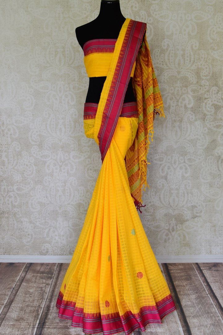 Buy beautiful yellow Bengal cotton saree online in USA with pink border. Look beautiful on special occasions with exquisite Jamdani sarees, cotton sarees, soft silk sarees, handwoven sarees in from Pure Elegance Indian saree store in USA.-full view