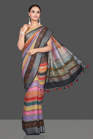 Shop beautiful multicolor striped linen sari online in USA. Look glamorous at parties and weddings in stunning designer sarees, embroidered sarees, fancy sarees, Bollywood sarees, linen sarees from Pure Elegance Indian saree store in USA.-front