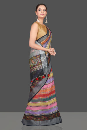 Shop beautiful multicolor striped linen sari online in USA. Look glamorous at parties and weddings in stunning designer sarees, embroidered sarees, fancy sarees, Bollywood sarees, linen sarees from Pure Elegance Indian saree store in USA.-right