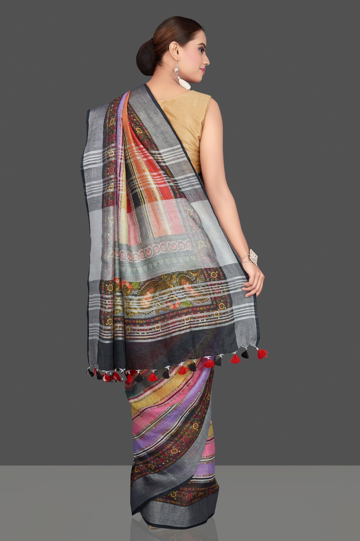 Shop beautiful multicolor striped linen sari online in USA. Look glamorous at parties and weddings in stunning designer sarees, embroidered sarees, fancy sarees, Bollywood sarees, linen sarees from Pure Elegance Indian saree store in USA.-back