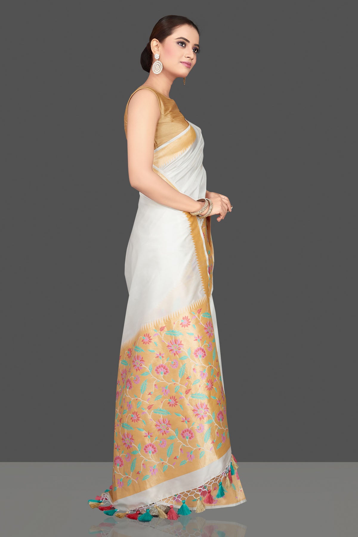 Buy beautiful white silk Katan saree online in USA with heavy zari floral minakari border. Look gorgeous on special occasions with exquisite Indian sarees, handwoven sarees, Banarasi sarees, pure silk sarees from Pure Elegance Indian saree store in USA.-side