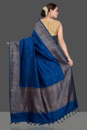 Buy stunning dark blue tussar Banarasi saree online in USA with antique zari buta border. Go for stunning Indian designer sarees, georgette sarees, handwoven saris, embroidered sarees for festive occasions and weddings from Pure Elegance Indian clothing store in USA.-back
