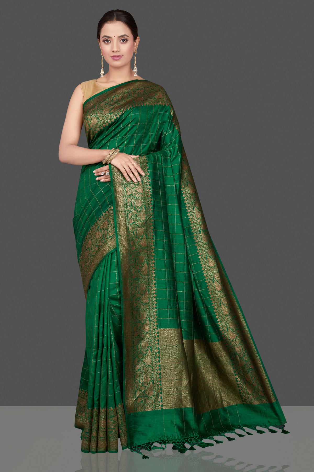 Shop stunning green check tussar Banarasi saree online in USA with antique zari border. Go for stunning Indian designer sarees, georgette sarees, handwoven saris, embroidered sarees for festive occasions and weddings from Pure Elegance Indian clothing store in USA.-front