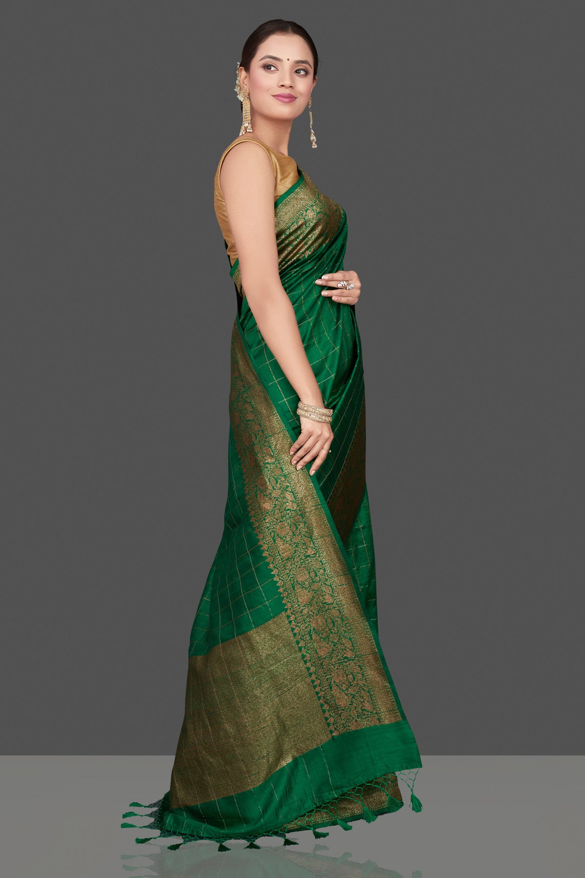 Shop stunning green check tussar Banarasi saree online in USA with antique zari border. Go for stunning Indian designer sarees, georgette sarees, handwoven saris, embroidered sarees for festive occasions and weddings from Pure Elegance Indian clothing store in USA.-side