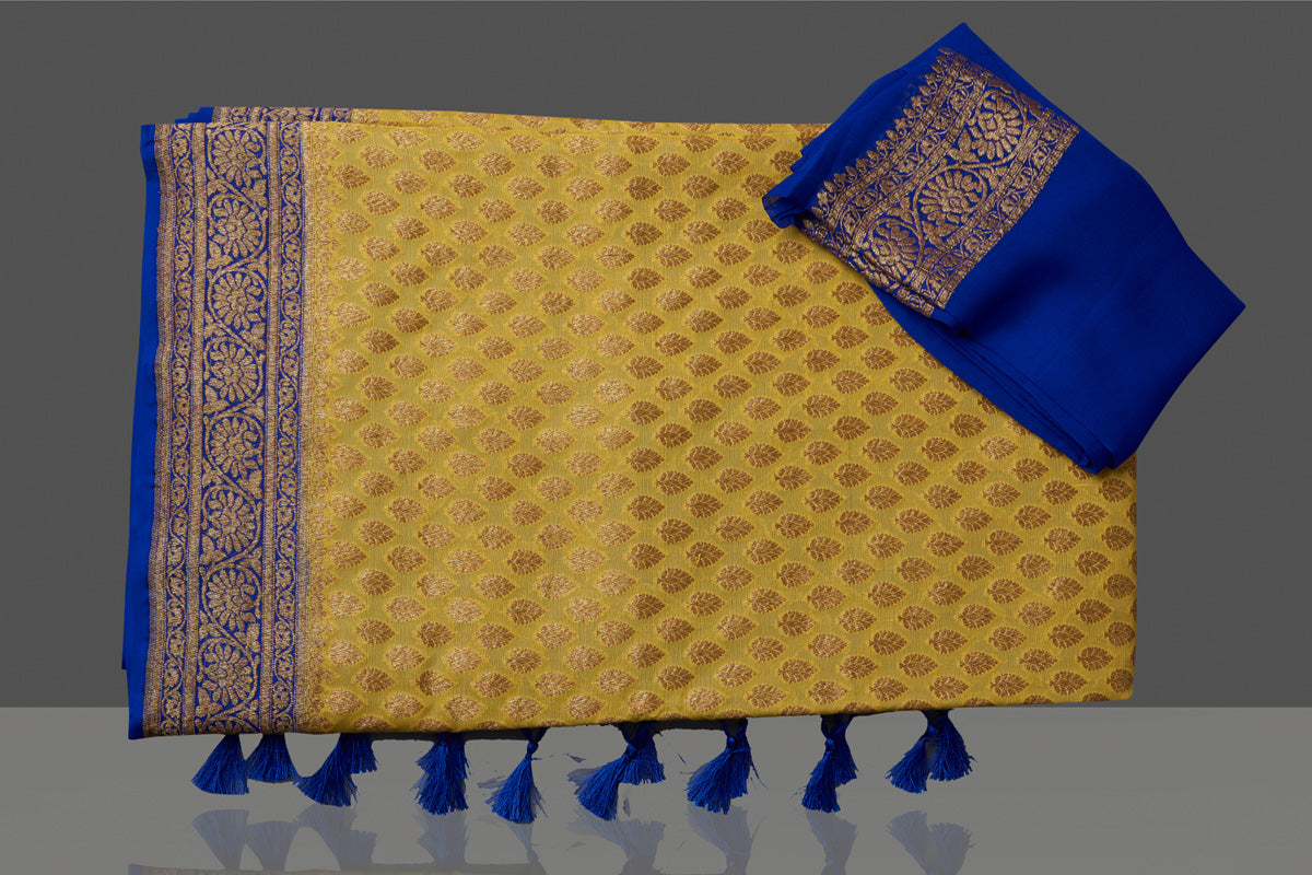 Buy stunning yellow georgette Banarasi saree online in USA with blue zari border. Get ready for festive occasions and weddings in tasteful designer sarees, Banarasi sarees, handwoven sarees from Pure Elegance Indian clothing store in USA.-blouse