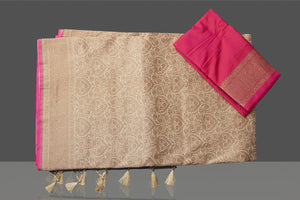 Buy beautiful beige tussar Banarasi saree online in USA with golden zari work. Get ready for festive occasions and weddings in tasteful designer saris, Banarasi sarees, handwoven sarees from Pure Elegance Indian clothing store in USA.-blouse