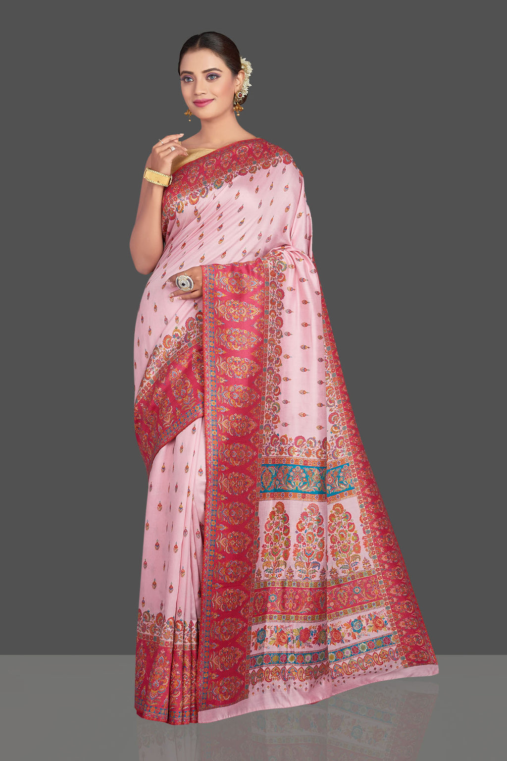 Shop stunning light pink Kani embroidery tussar silk saree online in USA. Make your presence felt on special occasions in beautiful embroidered sarees, handwoven sarees, pure silk saris, tussar sarees from Pure Elegance Indian saree store in USA.-full view