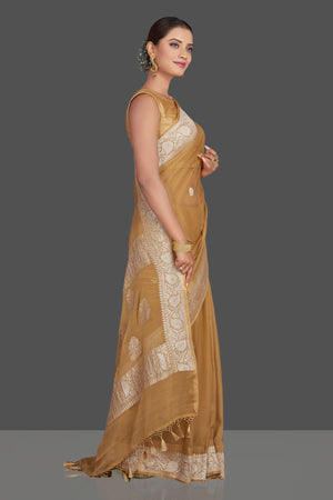 Buy beautiful beige chiffon georgette Banarasi saree online in USA with silver zari border. Look your best on special occasions with stunning Banarasi sarees, pure silk saris, tussar saris, handwoven sarees from Pure Elegance Indian saree store in USA.-side