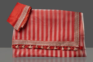 Shop beautiful cream and red striped and embroidered organza saree online in USA. Turn heads on special occasion in stunning handwoven sarees, organza saris, pure silk sarees, Banarasi sarees, embroidered sarees from Pure Elegance Indian saree store in USA.-blouse