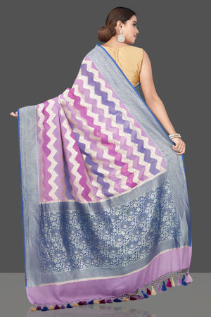 Shop stunning shaded lavender sari online in USA with chevron zari pattern. Get your hands on beautiful Indian handloom sarees, pure silk saris, designer sarees, embroidered sarees, Banarasi sarees from Pure Elegance Indian fashion store in USA.-back