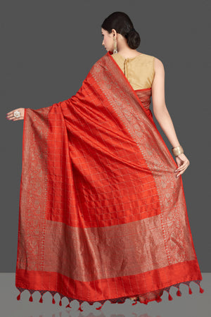 Shop stunning red tussar silk saree online in USA with golden zari border. Be the center of attraction at weddings and special occasions in exquisite designer sarees, handwoven silk saris, embroidered sarees, pure silk sarees from Pure Elegance Indian fashion store in USA.-back