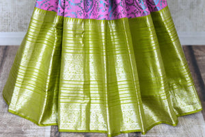 Shop gorgeous lavender Kanjivaram sari online in USA with green zari border. Be the center of attraction at parties and weddings in exclusive Kanchipuram silk sarees, pure silk sarees, handloom silk sarees, Banarasi silk sarees from Pure Elegance Indian fashion store in USA.-pleats