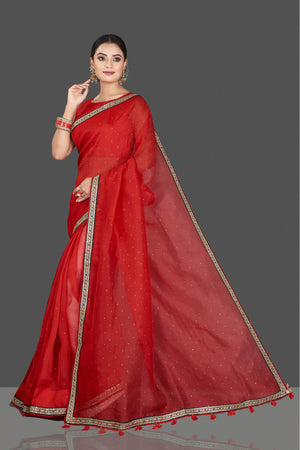 Buy stunning red organza saree online in USA with embroidered border. Keep your Indian wardrobe update with exclusive designer sarees, pure silk sarees, handloom silk sarees, Banarasi sarees from Pure Elegance Indian fashion store in USA.-pallu