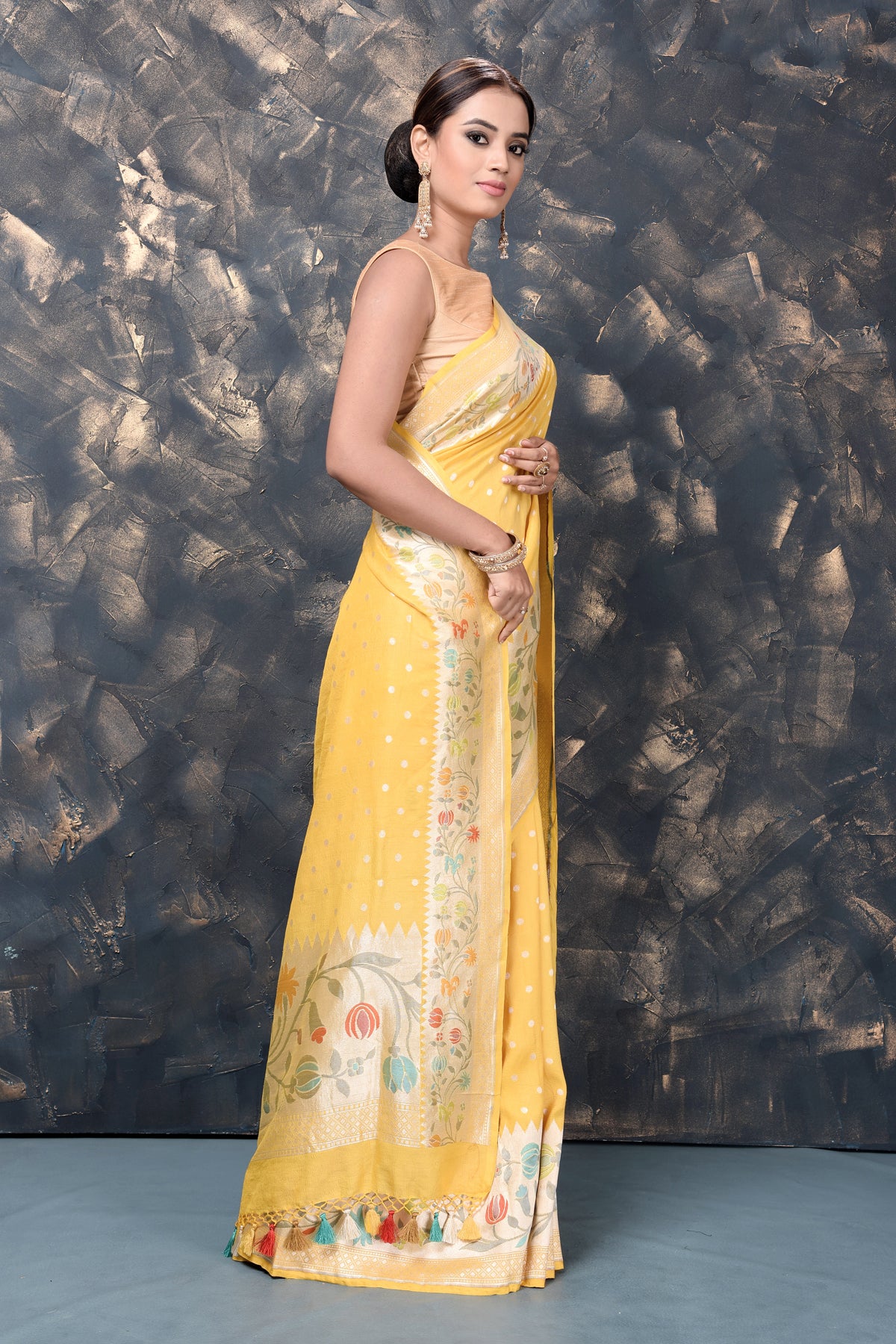 Shop stunning yellow georgette tussar Paithani silk saree online in USA. Keep your ethnic wardrobe updated with an exclusive range of designer sarees, pure silk sarees, handloom sarees, embroidered sarees, printed sarees, fancy sari from Pure Elegance Indian fashion store in USA.-side