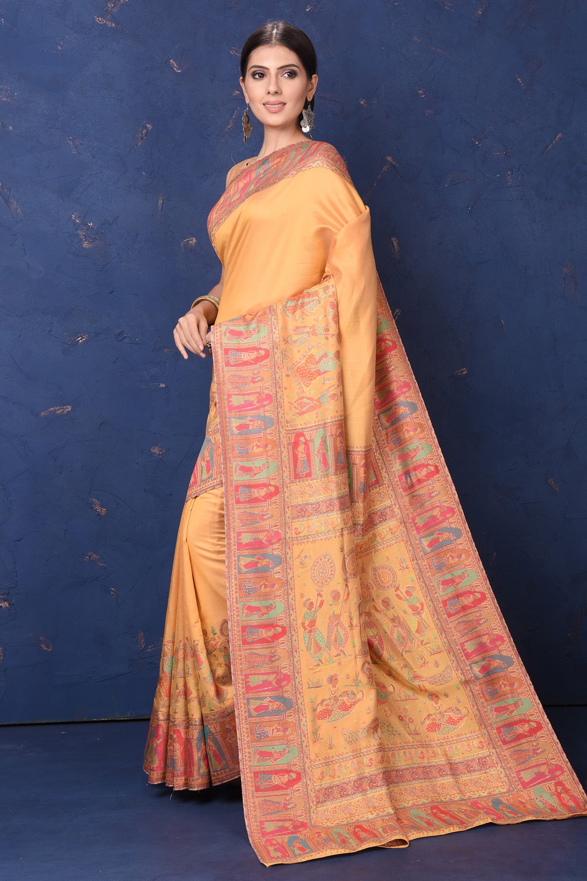Shop stunning yellow Kani weave tussar muga silk saree online in USA. Buy latest designer sarees, handloom saris, embroidered sarees, Bollywood sarees, fancy sarees for special occasions from Pure Elegance Indian fashion store in USA. Shop soft silk sarees, pure Banarasi sarees, cotton sarees, georgette sarees. -pallu