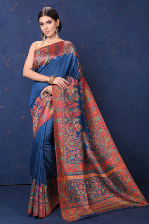 Shop stunning blue Kani tussar muga silk saree online in USA with Kani border. Buy latest designer sarees, handloom saris, embroidered sarees, Bollywood sarees, fancy sarees for special occasions from Pure Elegance Indian fashion store in USA. Shop soft silk sarees, pure Banarasi sarees, cotton sarees, georgette sarees. -front