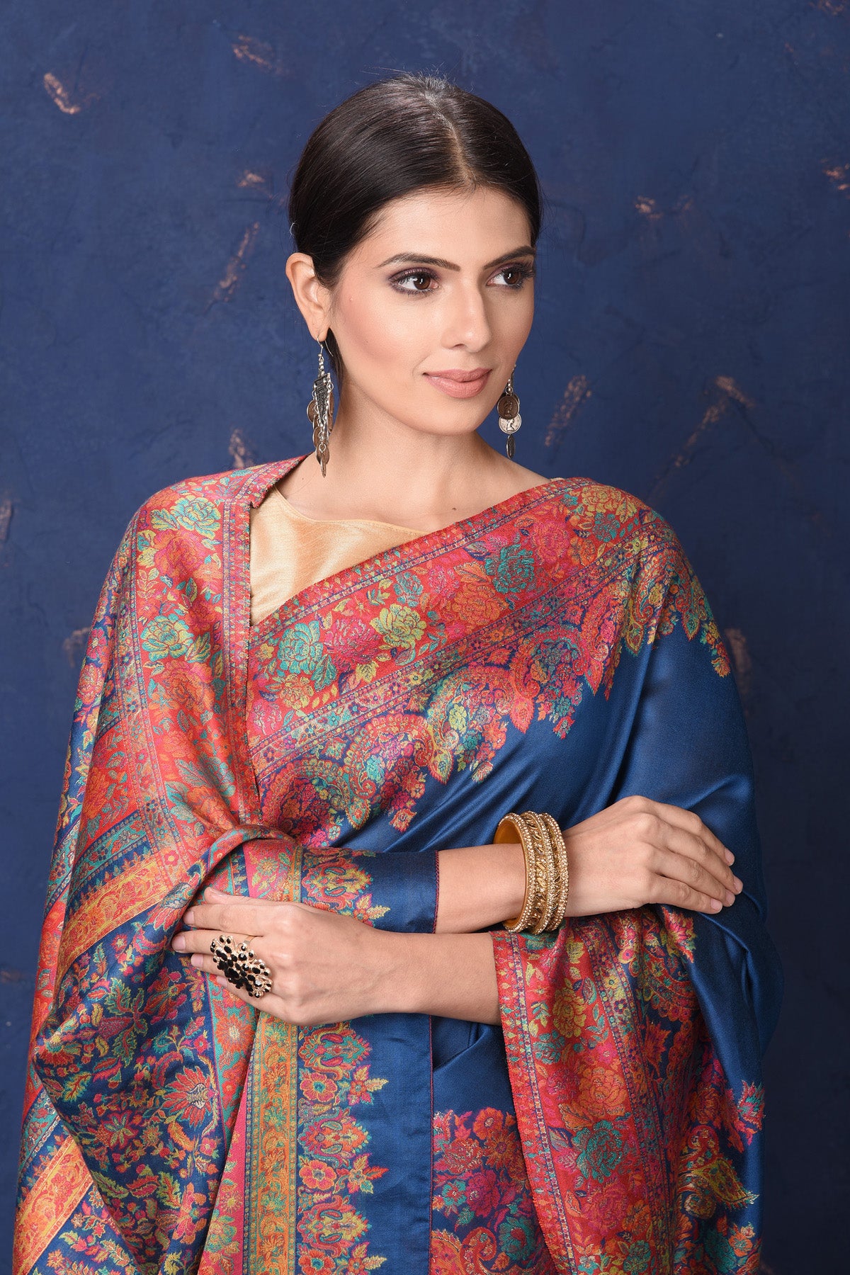 Shop stunning blue Kani tussar muga silk saree online in USA with Kani border. Buy latest designer sarees, handloom saris, embroidered sarees, Bollywood sarees, fancy sarees for special occasions from Pure Elegance Indian fashion store in USA. Shop soft silk sarees, pure Banarasi sarees, cotton sarees, georgette sarees. -closeup