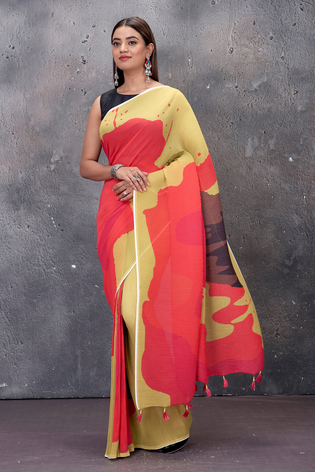 Shop stunning yellow and pink abstract micro pleats saree online in USA. Keep your ethnic wardrobe up to date with latest designer saris, pure silk sarees, handwoven sarees, tussar silk sarees, embroidered saris from Pure Elegance Indian saree store in USA.-full view
