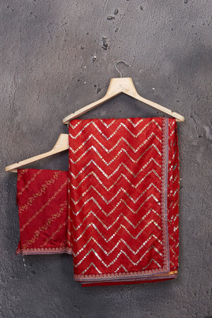 Shop stunning red chevron foil print Kota saree online in USA. Keep your ethnic wardrobe up to date with latest designer saris, pure silk sarees, handwoven sarees, tussar silk sarees, embroidered saris from Pure Elegance Indian saree store in USA.-blouse