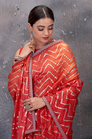 Shop stunning red chevron foil print Kota saree online in USA. Keep your ethnic wardrobe up to date with latest designer saris, pure silk sarees, handwoven sarees, tussar silk sarees, embroidered saris from Pure Elegance Indian saree store in USA.-closeup