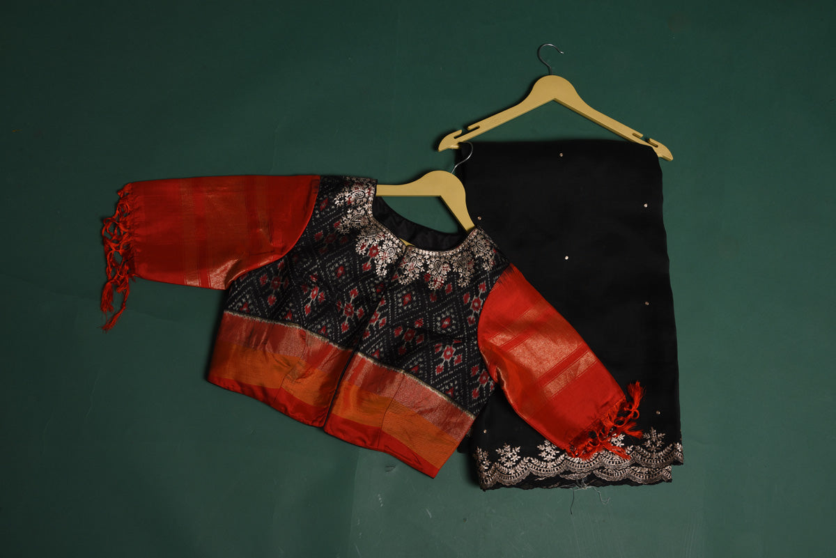 Buy this exquisite black saree in soft organza with heavy lace border online in USA which is made of organza fabric and lightweight. This organza Saree is beautified with lace work and latest trend. Ideal for casual, kitty parties, stylish accessories. Shop this from Pure Elegance Indian fashion store in USA.-Ready blouse.