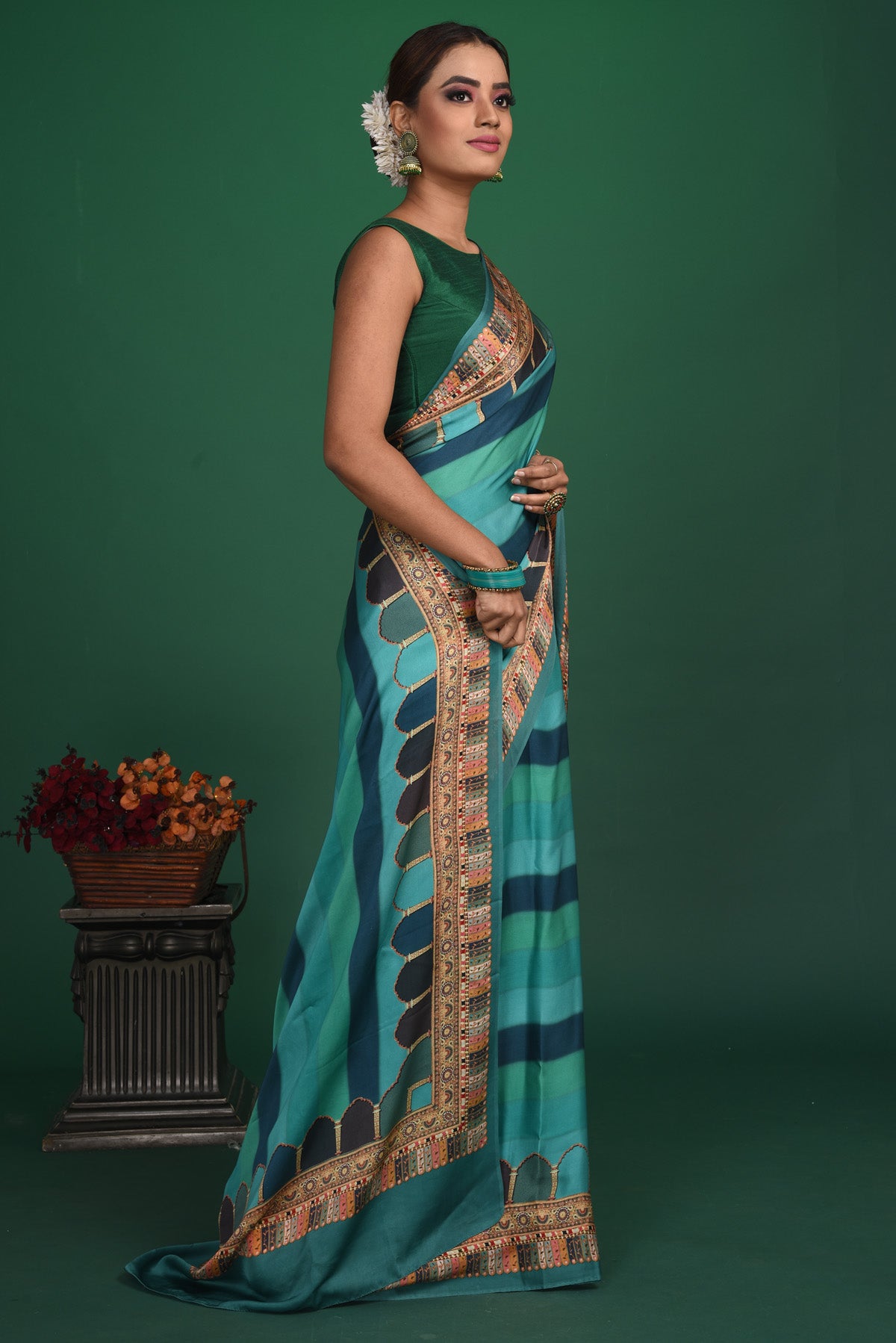 Shop stunning blue striped printed crepe satin saree online in USA. Be a vision of style and elegance at parties and special occasions in beautiful designer sarees, embroidered sarees, printed sarees, satin saris from Pure Elegance Indian fashion store in USA.-side