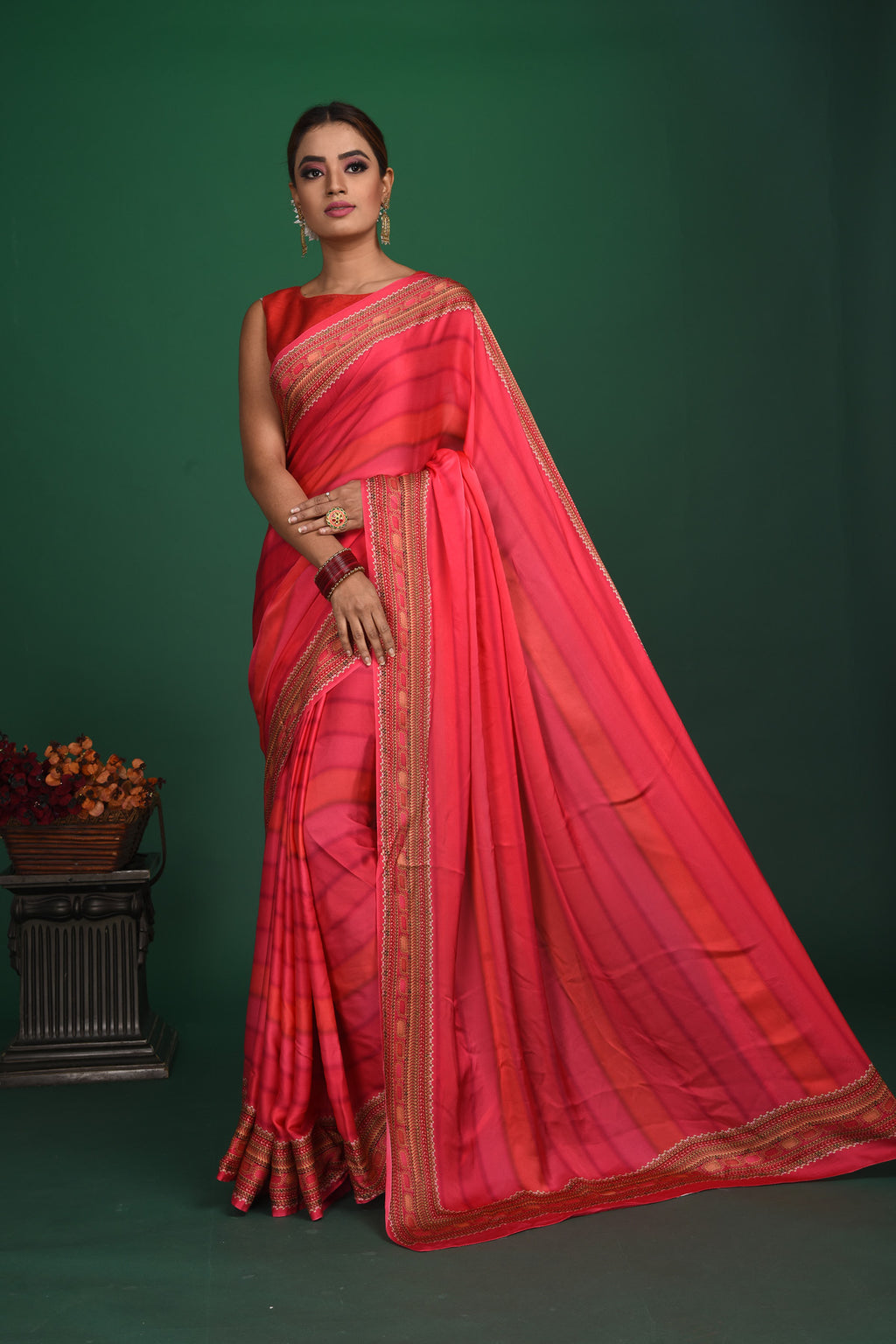 Buy stunning pink striped printed crepe satin saree online in USA. Be a vision of style and elegance at parties and special occasions in beautiful designer sarees, embroidered sarees, printed sarees, satin saris from Pure Elegance Indian fashion store in USA.-full view
