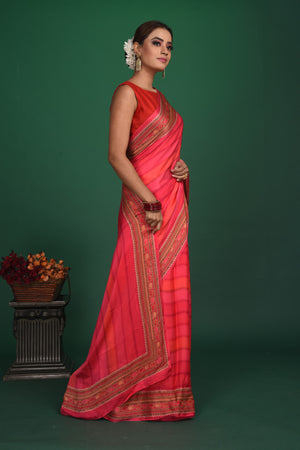 Buy stunning pink striped printed crepe satin saree online in USA. Be a vision of style and elegance at parties and special occasions in beautiful designer sarees, embroidered sarees, printed sarees, satin saris from Pure Elegance Indian fashion store in USA.-side