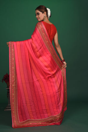 Buy stunning pink striped printed crepe satin saree online in USA. Be a vision of style and elegance at parties and special occasions in beautiful designer sarees, embroidered sarees, printed sarees, satin saris from Pure Elegance Indian fashion store in USA.-back