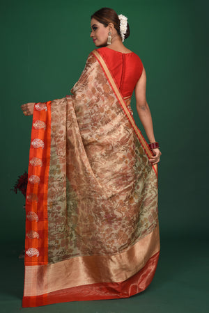 Buy beautiful beige printed Kanjeevaram saree online in USA with red and orange border. Be a vision of style and elegance at parties and special occasions in beautiful designer sarees, embroidered sarees, printed sarees, satin saris from Pure Elegance Indian fashion store in USA.-back