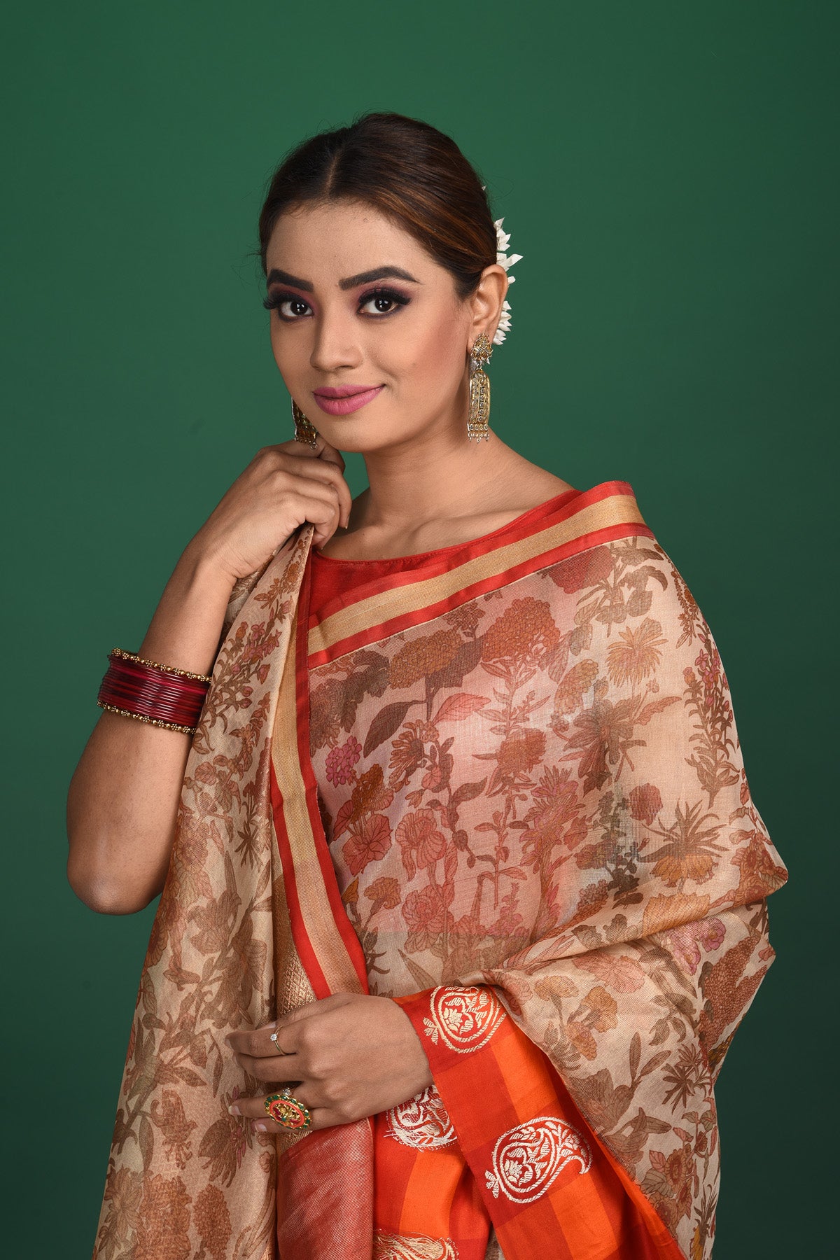 Buy beautiful beige printed Kanjeevaram saree online in USA with red and orange border. Be a vision of style and elegance at parties and special occasions in beautiful designer sarees, embroidered sarees, printed sarees, satin saris from Pure Elegance Indian fashion store in USA.-closeup
