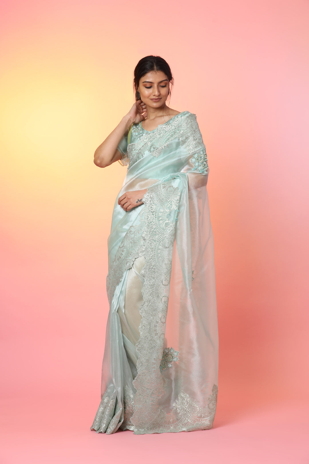 Shop stunning mint green tissue saree online in USA with lace border. Look perfect in ethnic style on special occasions in beautiful designer sarees, embroidered sarees, party sarees, Bollywood sarees, handloom sarees from Pure Elegance Indian saree store in USA.-front