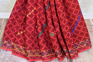 Buy beautiful red printed Kantha and mirror work cotton saree online in USA. Look elegant on special occasions in beautiful printed sarees, silk sarees, tussar sarees, handloom sarees, Kanchipuram sarees from Pure Elegance Indian saree store in USA.-pleats