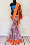 Shop beautiful purple gota work Paithani saree online in USA. Keep your ethnic wardrobe up to date with latest designer sarees, pure silk sarees, handwoven sarees, tussar silk sarees, embroidered saris, Paithani sarees from Pure Elegance Indian saree store in USA.-full view
