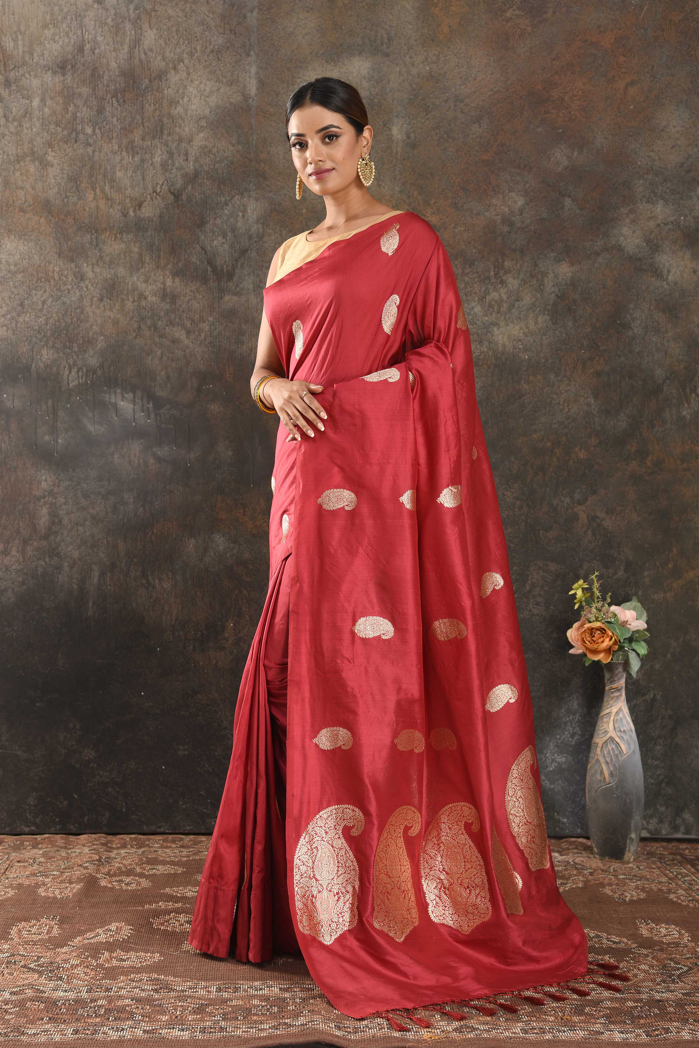 Buy beautiful red silk saree online in USA with silver zari paisley buta. Be vision of elegance on special occasions in exquisite designer sarees, handwoven sarees, georgette sarees, embroidered sarees, Banarasi sarees from Pure Elegance Indian saree store in USA.-pallu